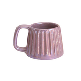 Handcrafted ceramic mug with an iridescent lavender glaze, blending soft purple tones with a subtle shimmer. Its soothing hue and elegant form bring calm and comfort to every sip.