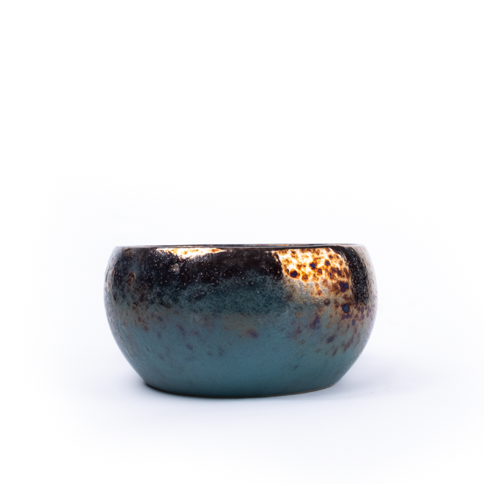 Large handcrafted stoneware serving bowl with textured surface and artisanal design