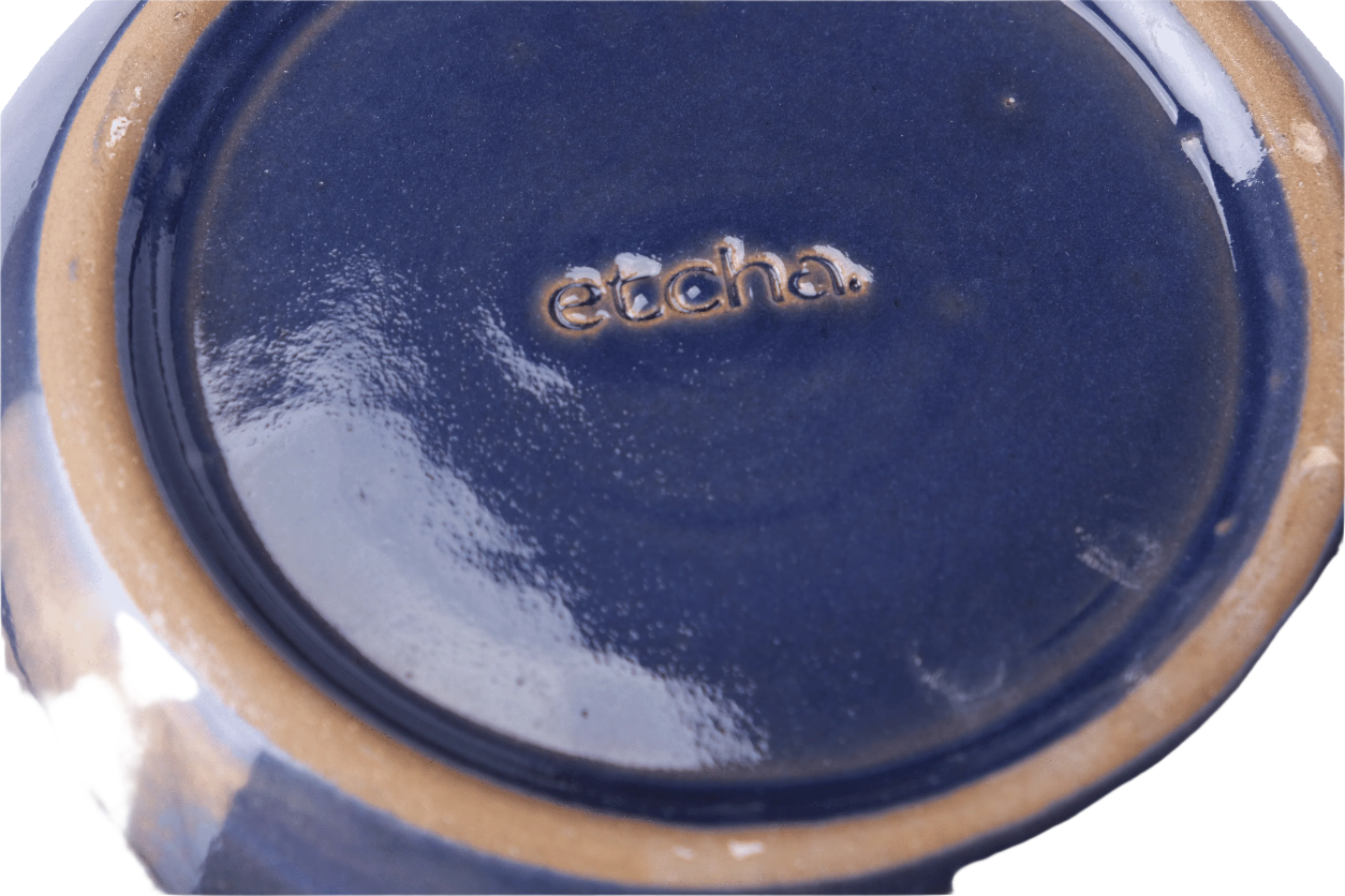 Large handcrafted stoneware serving bowl with textured surface and artisanal design