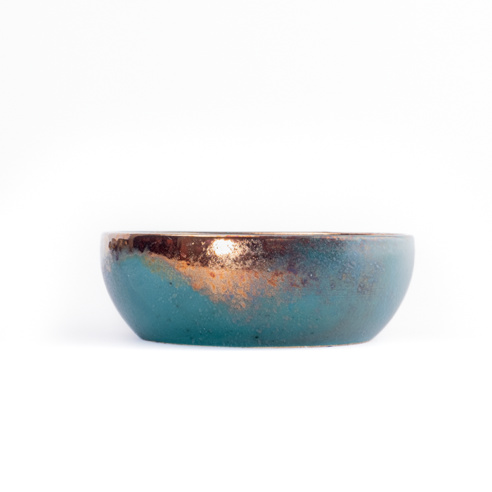 Handcrafted ceramic bowl set in Green Fusion tones, including serving and salad bowls