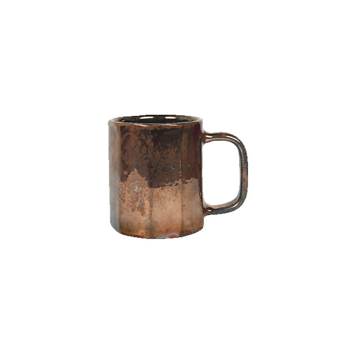 A stoneware mug with a shiny, metallic finish, appearing brownish-gold in color, with a cool-edged design.