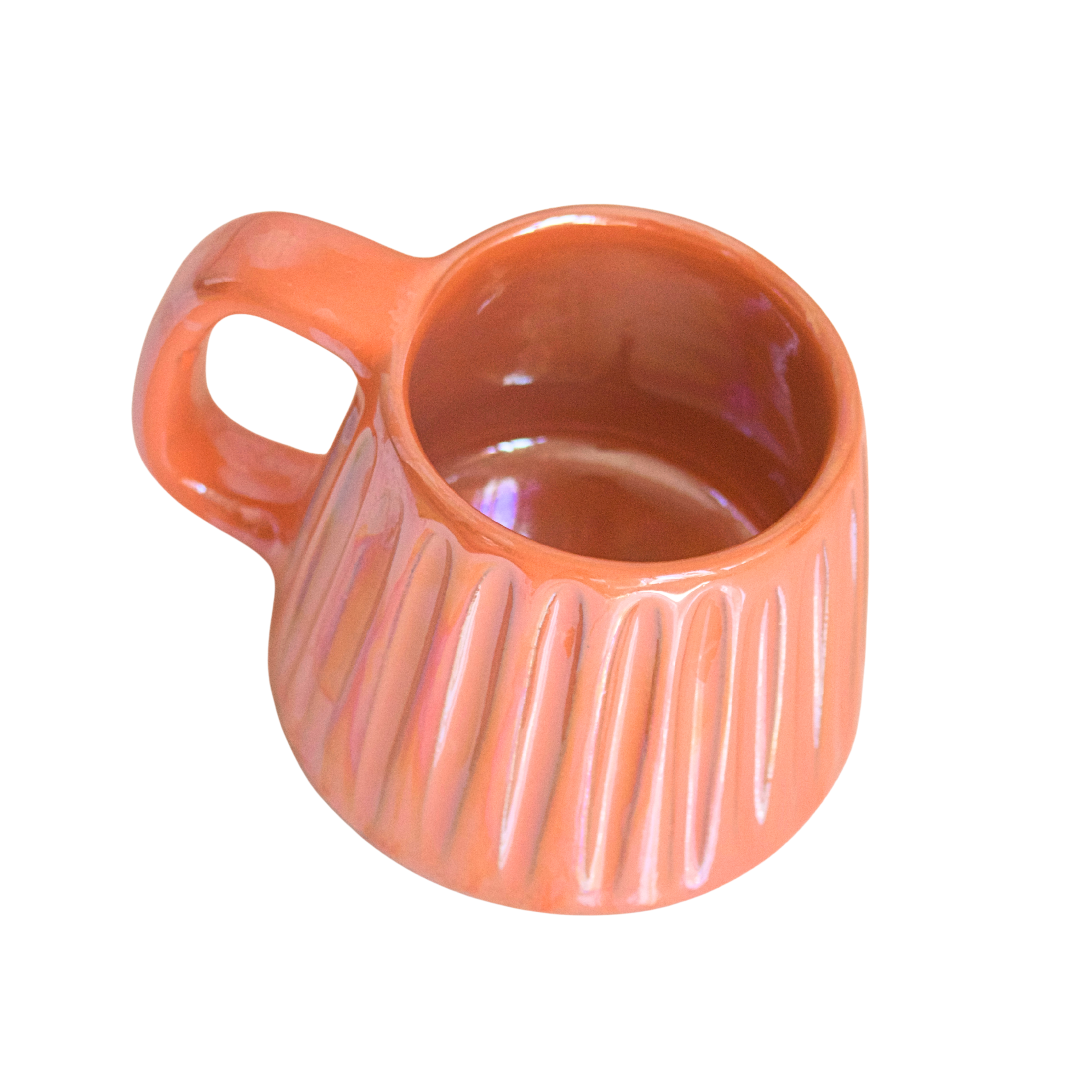 Handcrafted ceramic mug with an iridescent orange glaze, radiating citrusy warmth and playful energy. Its smooth shape and easy-grip handle make it a vibrant choice for your daily rituals.

