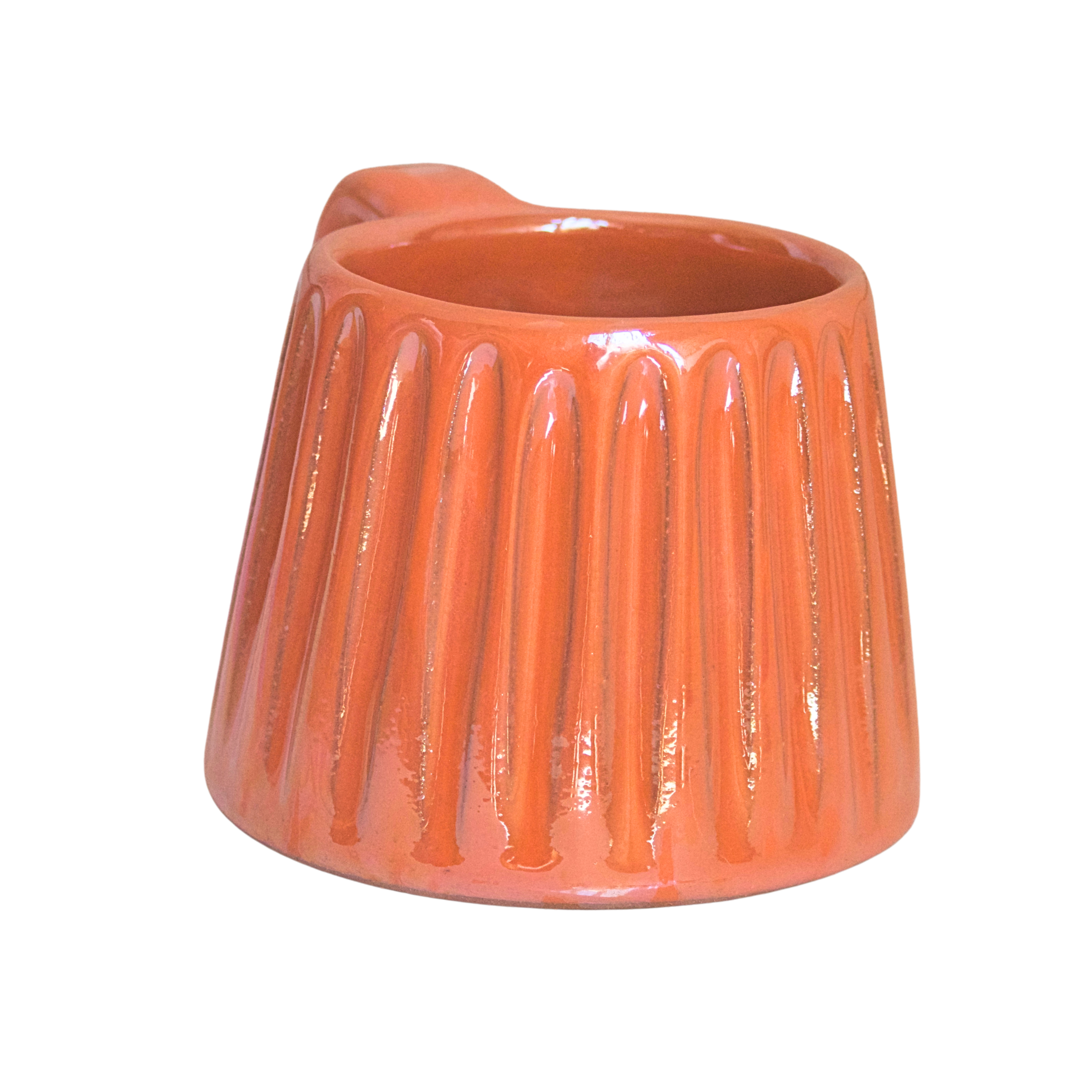 Handcrafted ceramic mug with an iridescent orange glaze, radiating citrusy warmth and playful energy. Its smooth shape and easy-grip handle make it a vibrant choice for your daily rituals.

