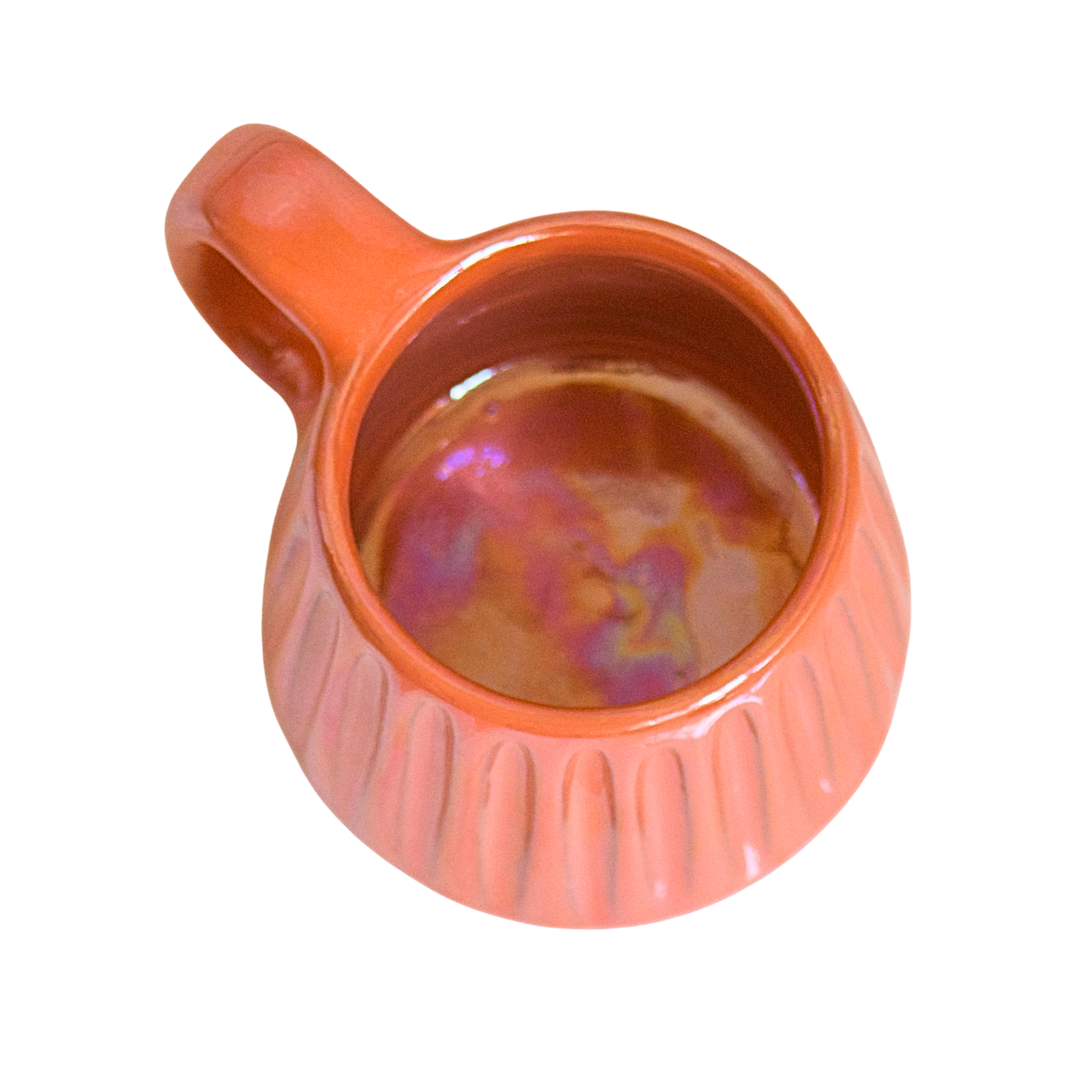 Handcrafted ceramic mug with an iridescent orange glaze, radiating citrusy warmth and playful energy. Its smooth shape and easy-grip handle make it a vibrant choice for your daily rituals.

