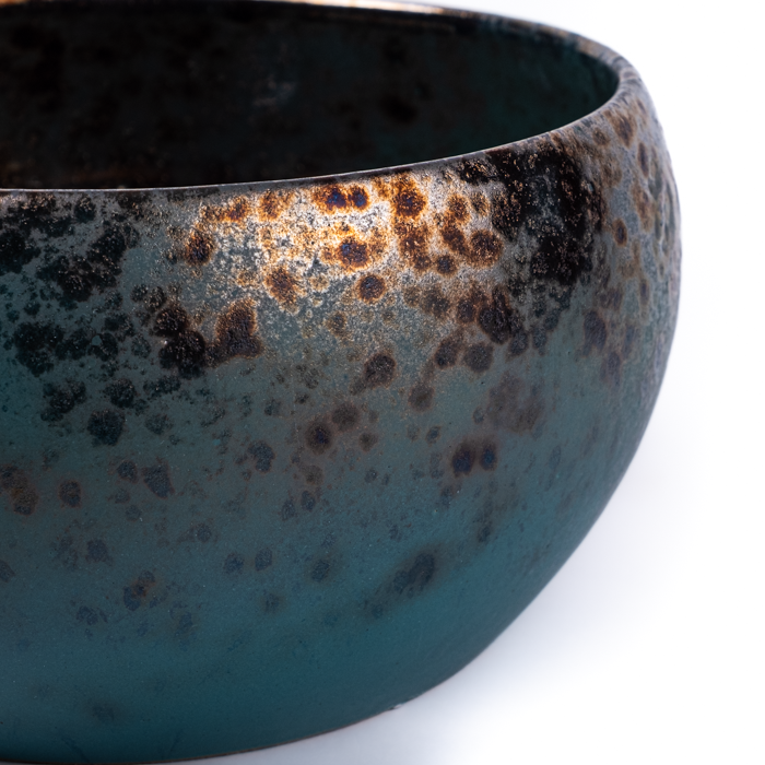 Large handcrafted stoneware serving bowl with textured surface and artisanal design