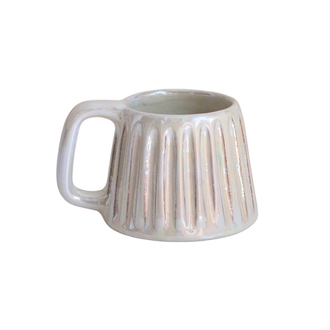 Handcrafted ceramic mug in a soft pearlescent white glaze, featuring a smooth, rounded shape and a minimalist handle. Perfect for elevating everyday rituals with a touch of elegance and simplicity.

